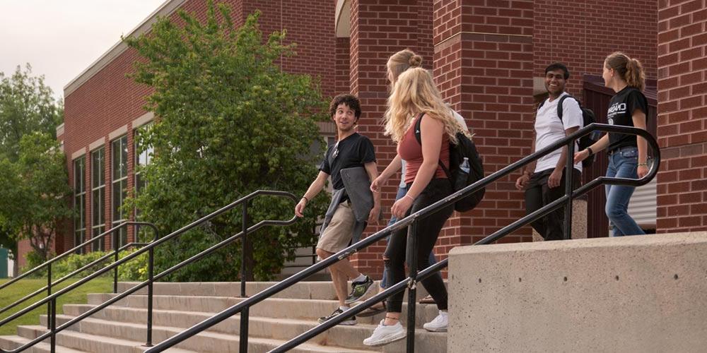 Students exploring campus outside the student center